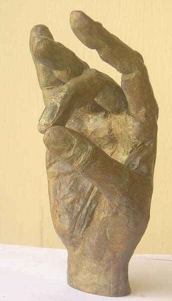 Mano Bronce
